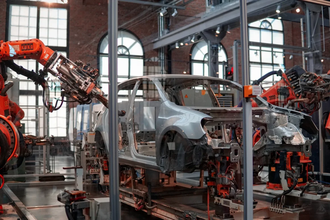 success story industrial robotics in car factory